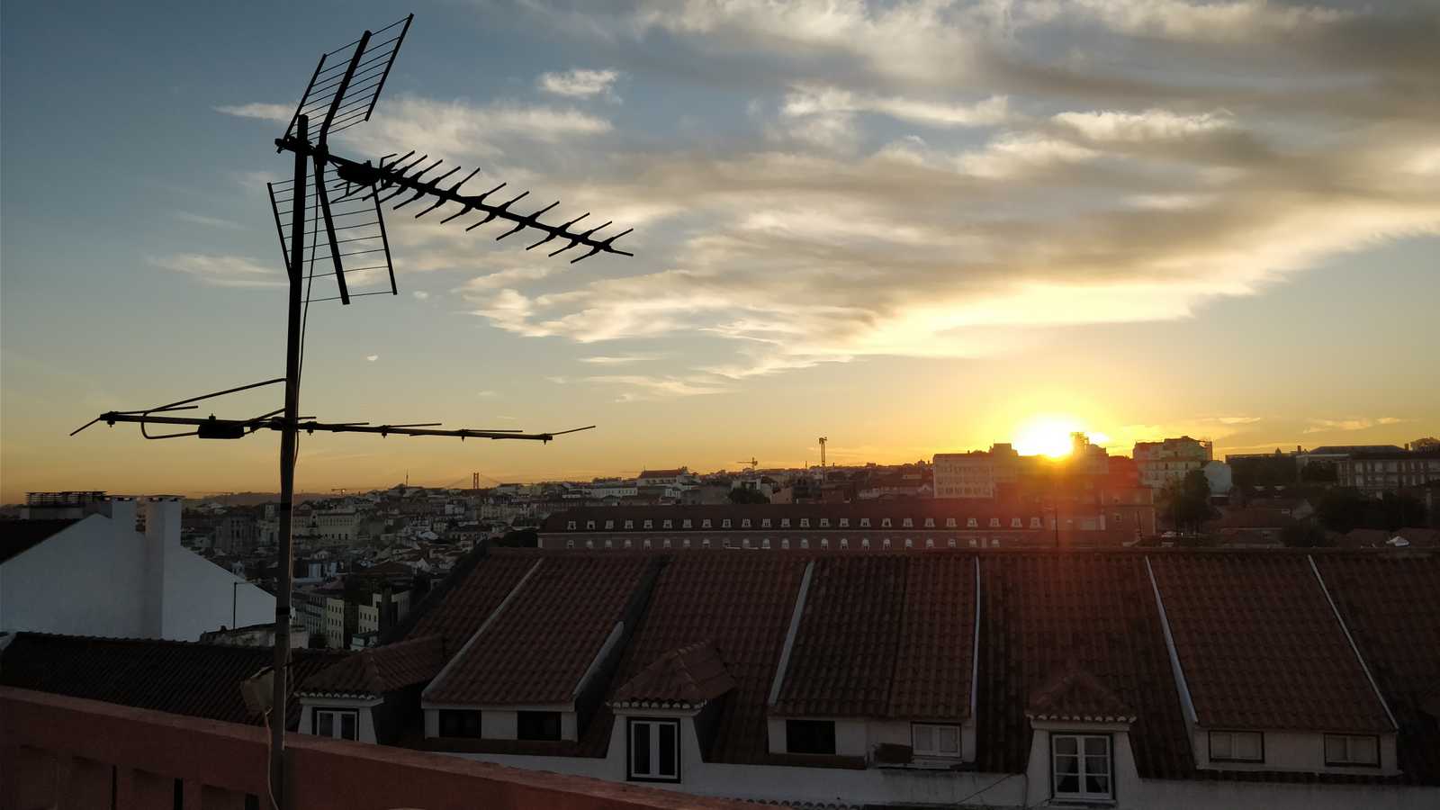 The sun setting in Lisbon